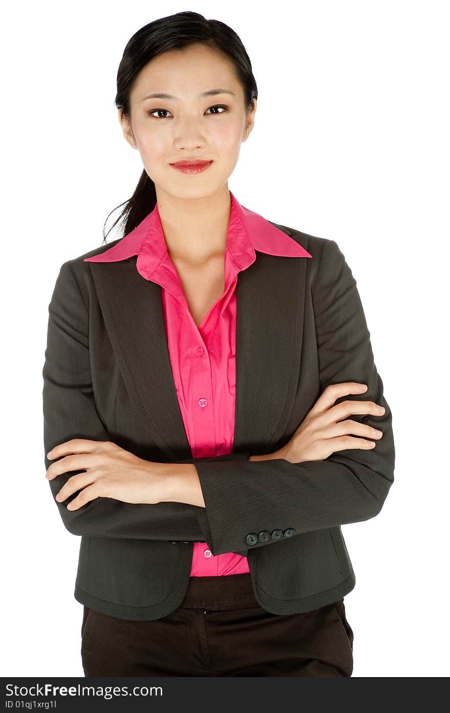 An attractive businesswoman posing in a studio