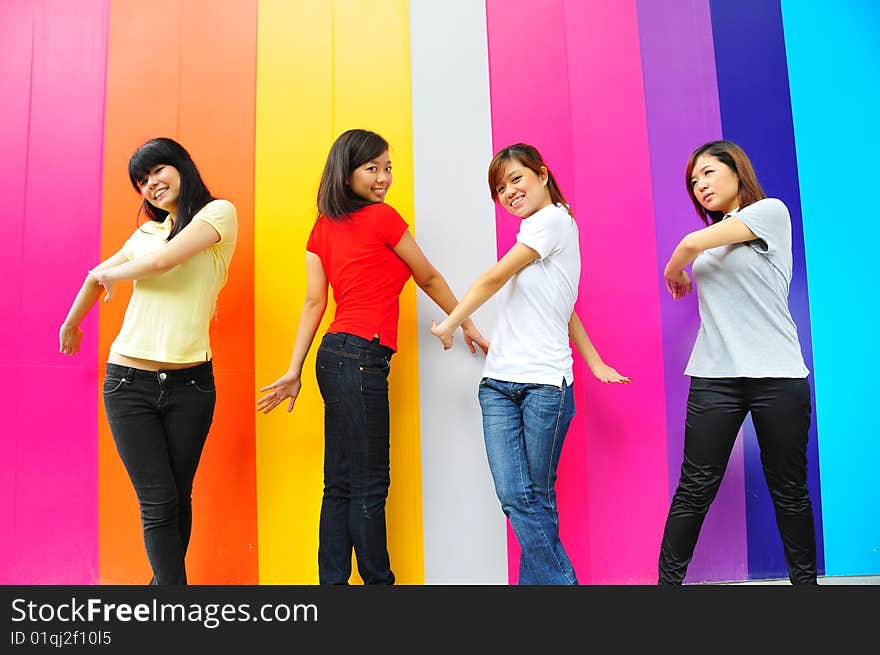 Beautiful Young Ladies With Colourful Background. Beautiful Young Ladies With Colourful Background.