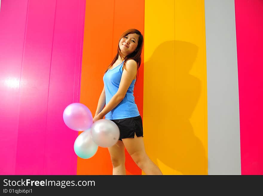 Young Asian Woman Holding Balloon Getting Ready For Party. Young Asian Woman Holding Balloon Getting Ready For Party.