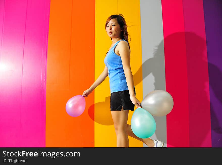 Young Asian Woman Holding Balloon Getting Ready For Party. Young Asian Woman Holding Balloon Getting Ready For Party.