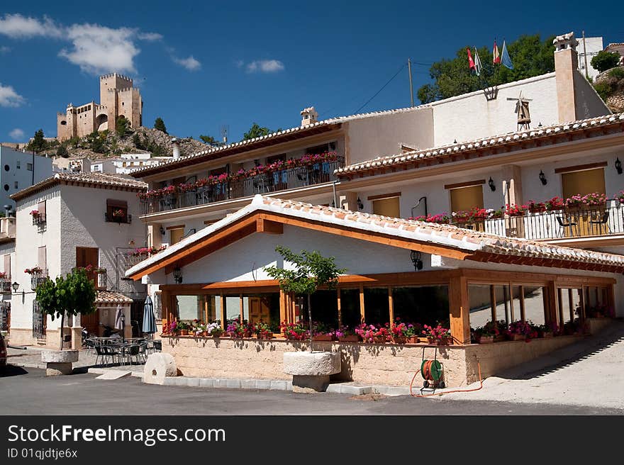 Spain castle on the hill overlooking small city. Andalusia, Spain. 2009