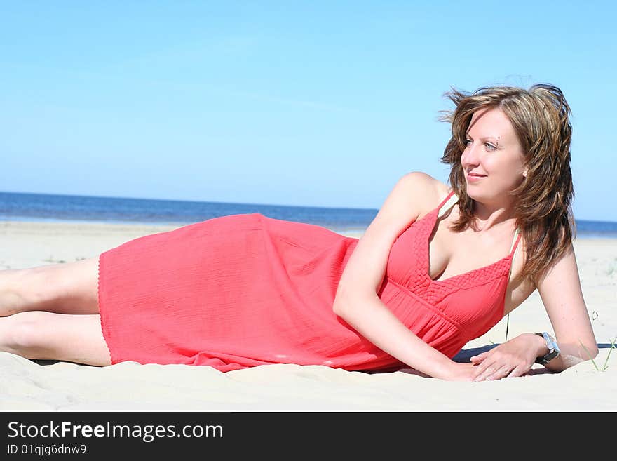 Young girl relaxing on the beach. Young girl relaxing on the beach