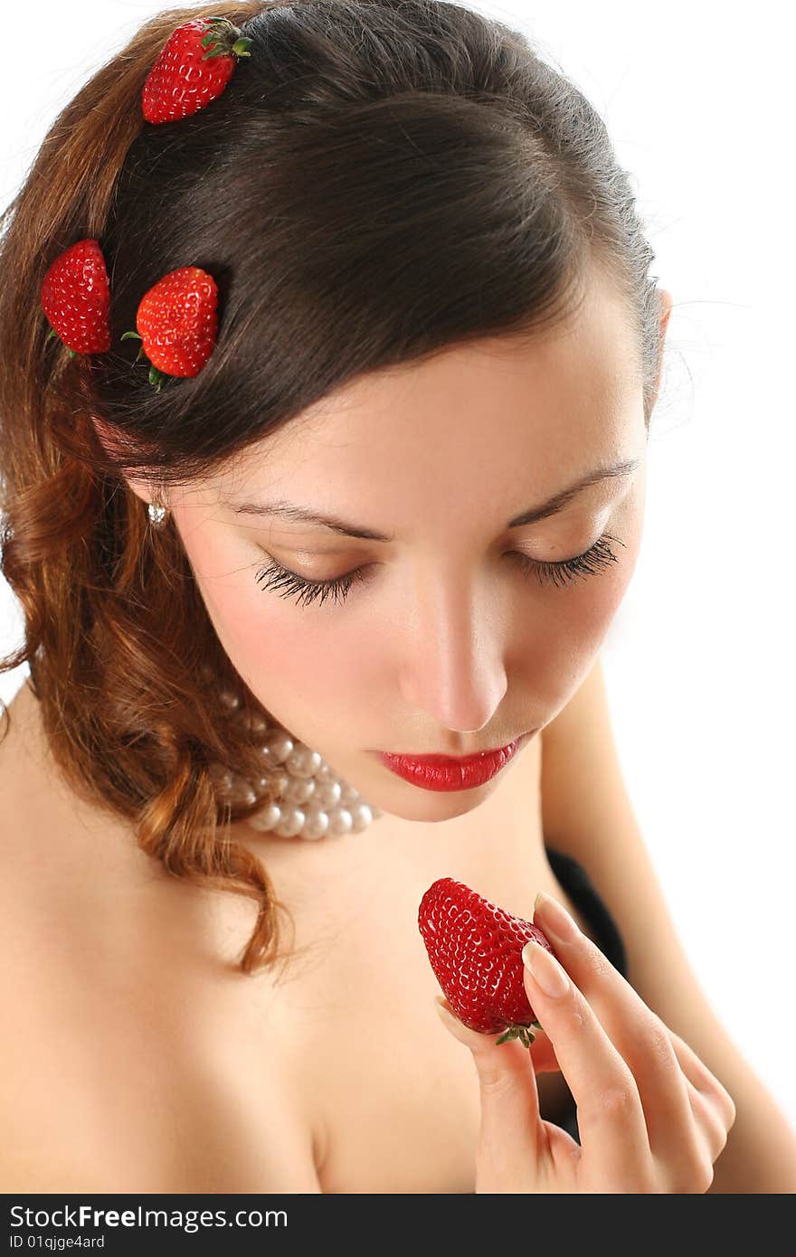 Sexy young woman eating fresh strawberry. Sexy young woman eating fresh strawberry