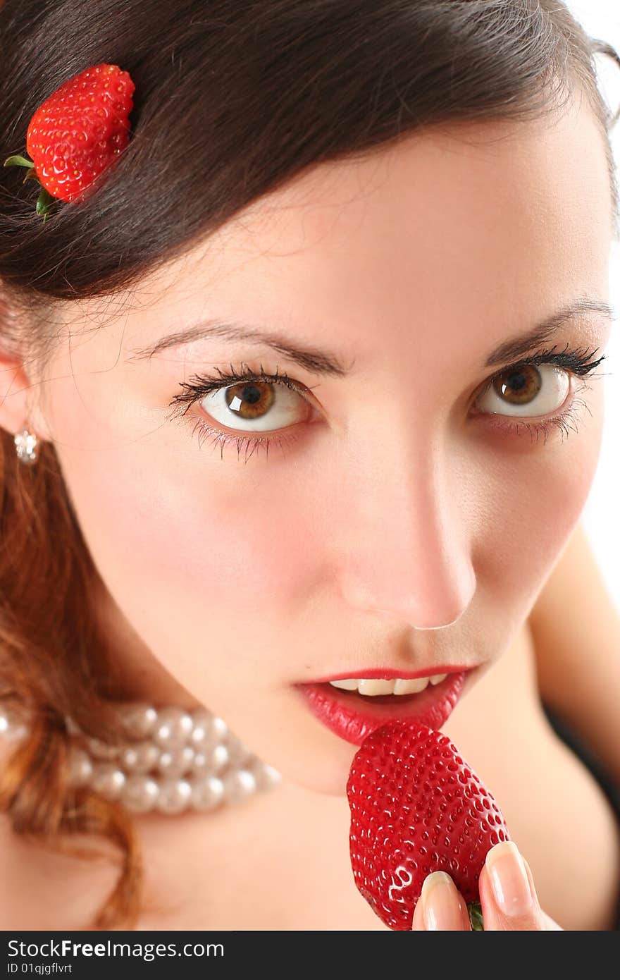 Sexy young woman eating fresh strawberry. Sexy young woman eating fresh strawberry