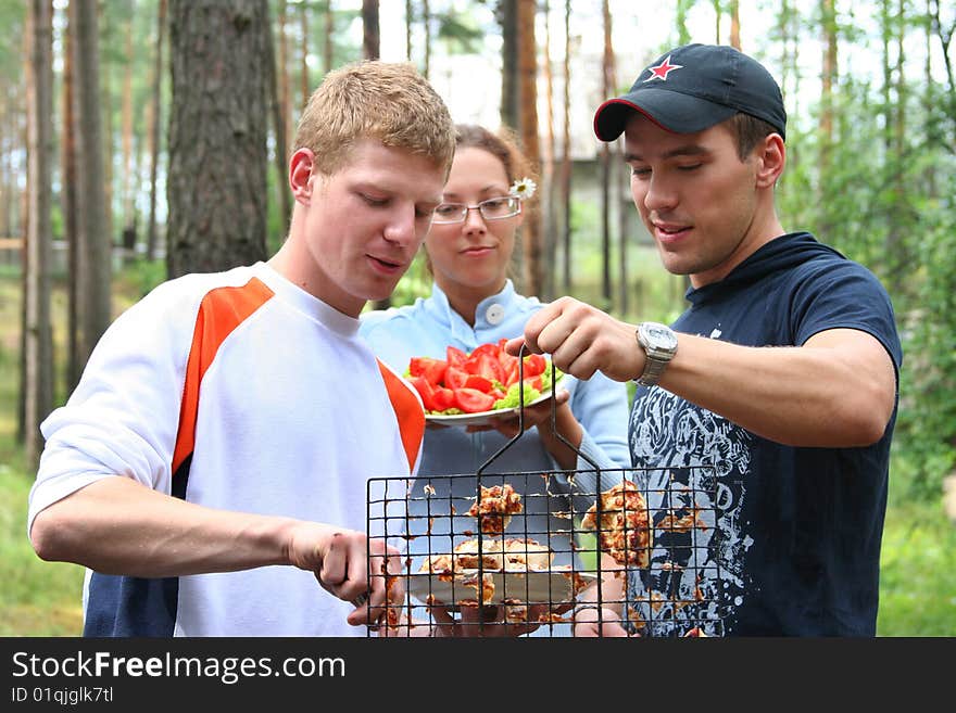 Young friends having fun on picnic