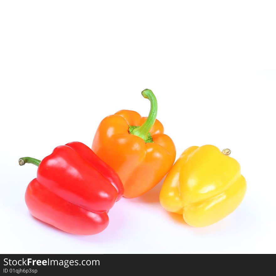 Bright colorful peppers isolated on white. Bright colorful peppers isolated on white