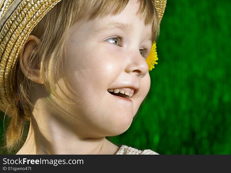 Little girl in green grass