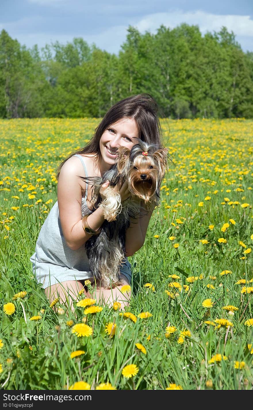 Girl and yorkshire terrier