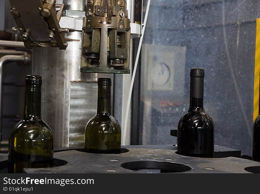 A picture of a bottling line of wine