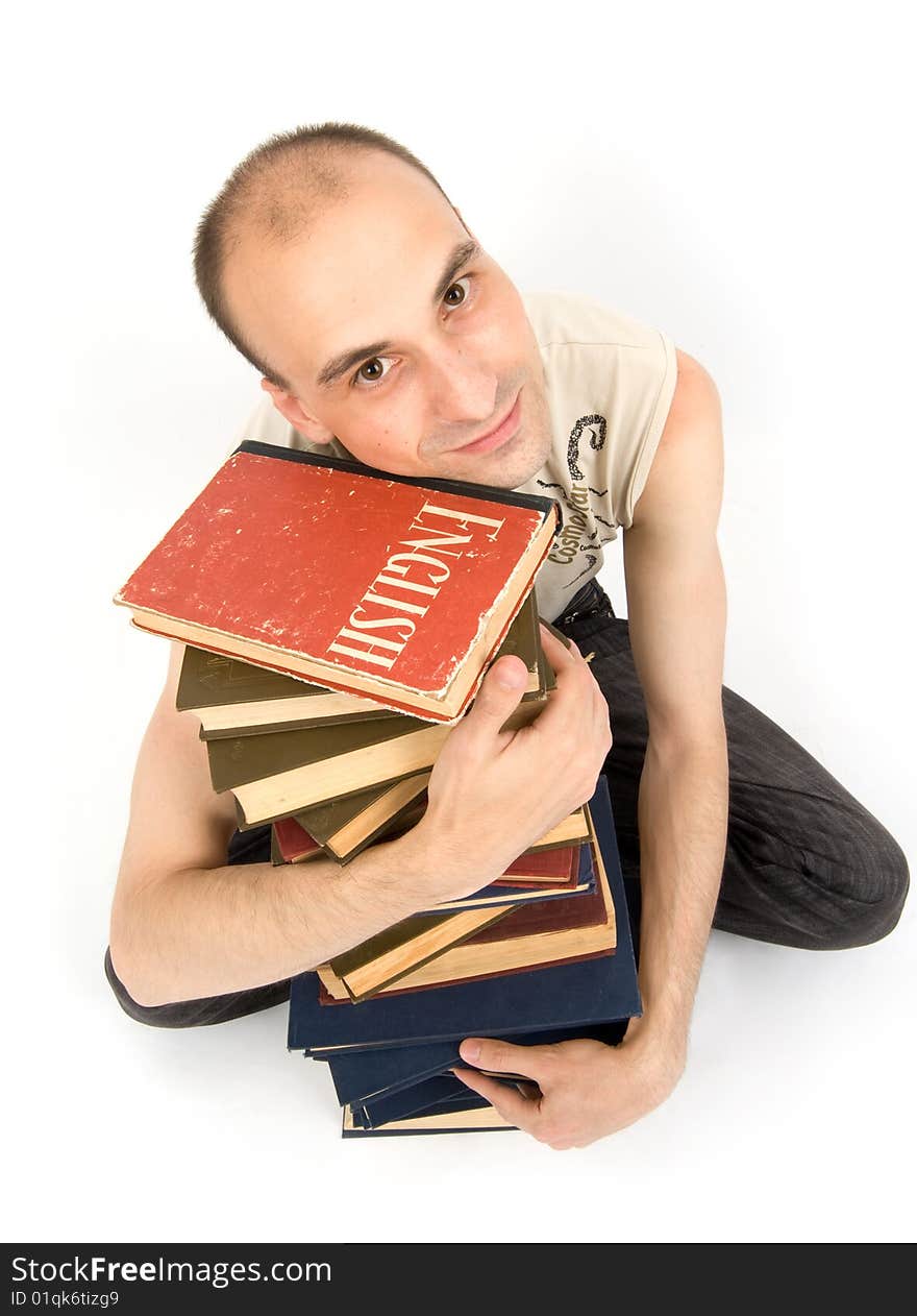 Happy young man with books