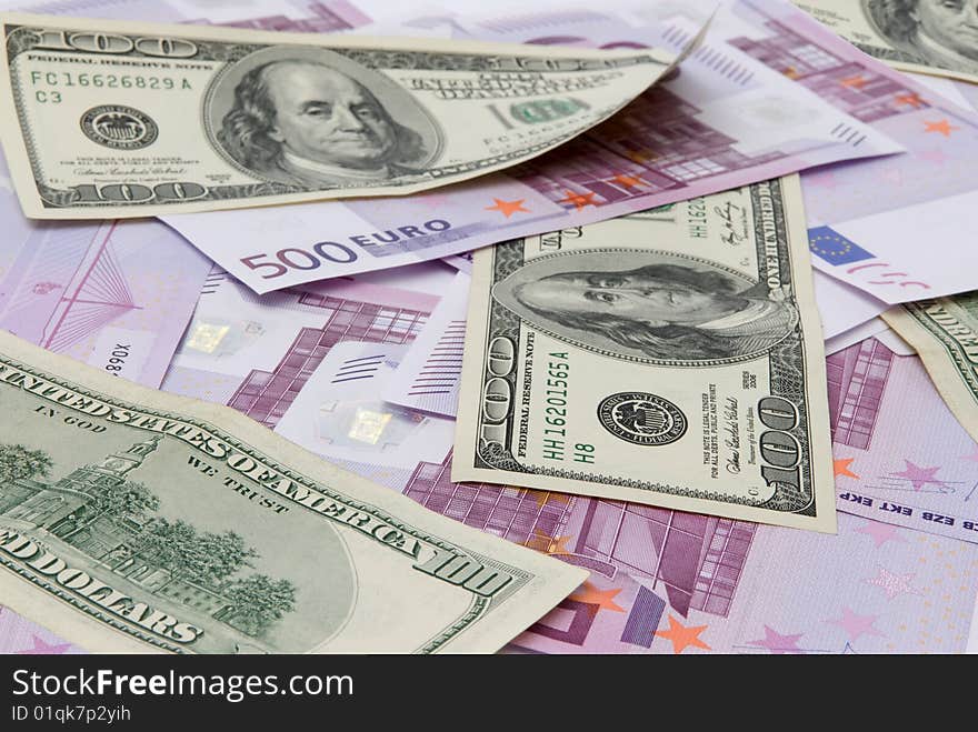 Background of one hundred dollars and euro. Background of one hundred dollars and euro