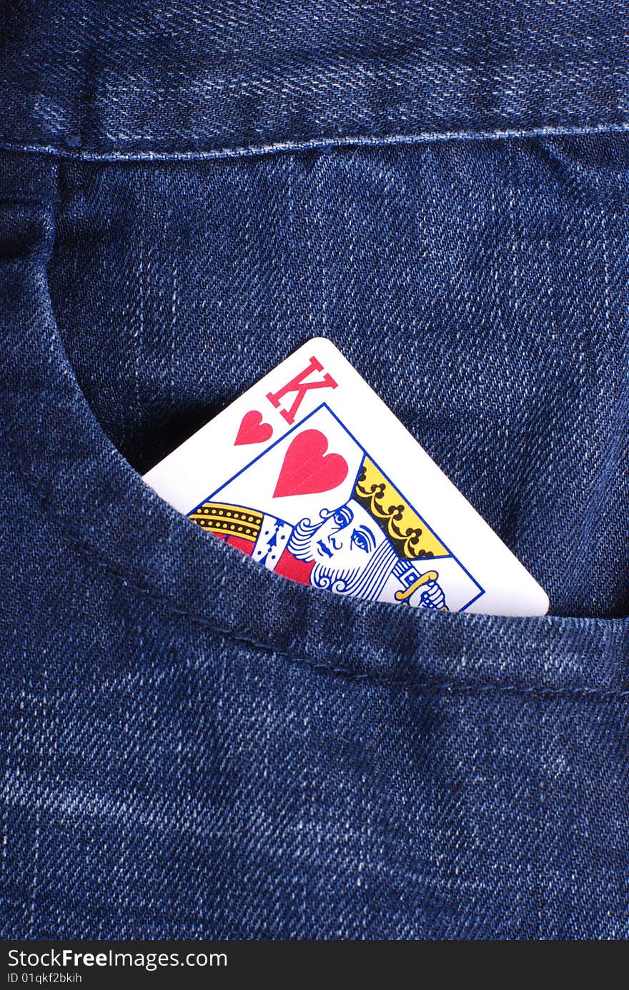 Poker:king of hearts in front pocket of jean