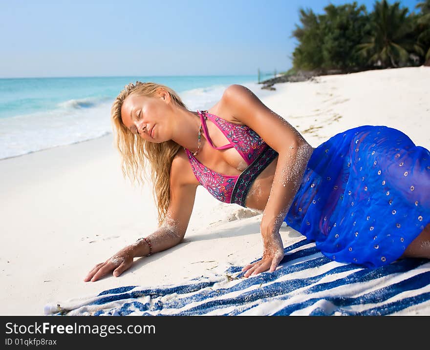 Beautiful Blondy Relaxing On Tropical Beach