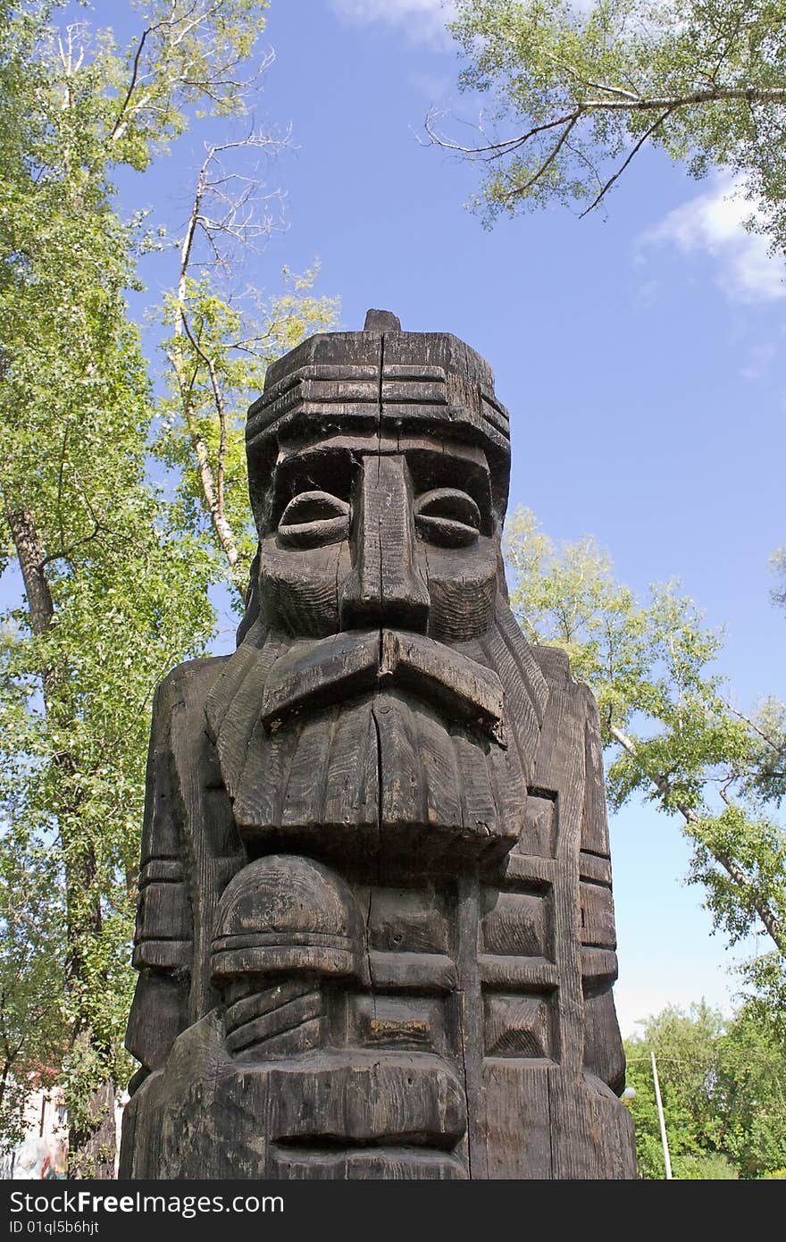 Landscape with a wooden pagan idol. Landscape with a wooden pagan idol