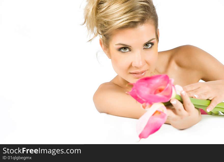 Blonde girl with flowers in hands isolated on white