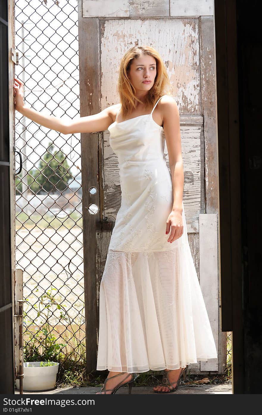 Beautiful young caucasian bride with wedding dress