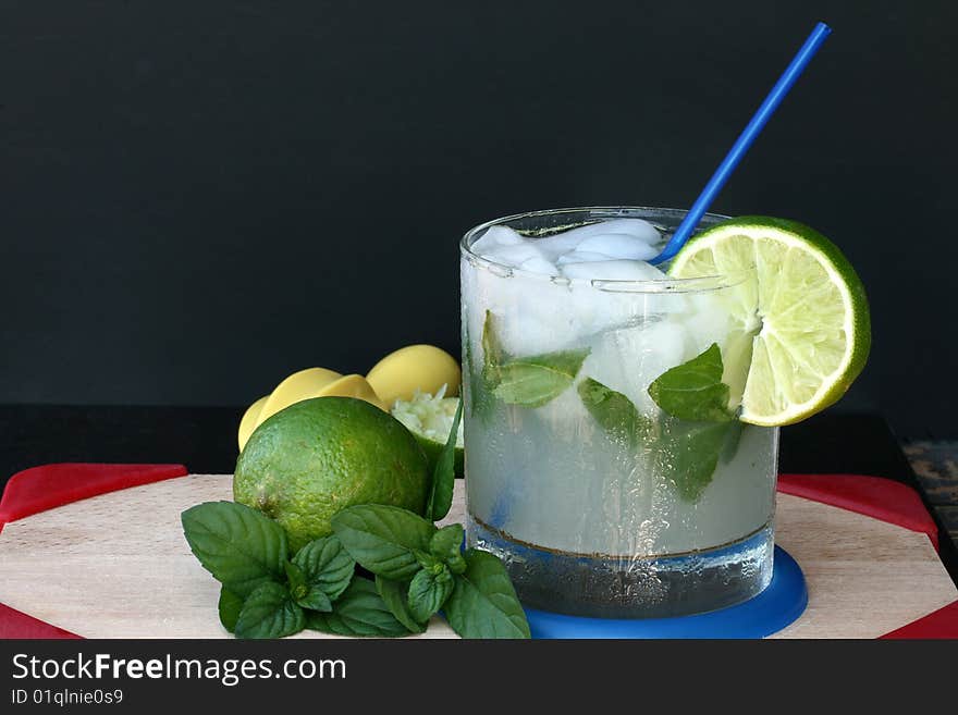 Mojito with mint, lime and straw. Mojito with mint, lime and straw