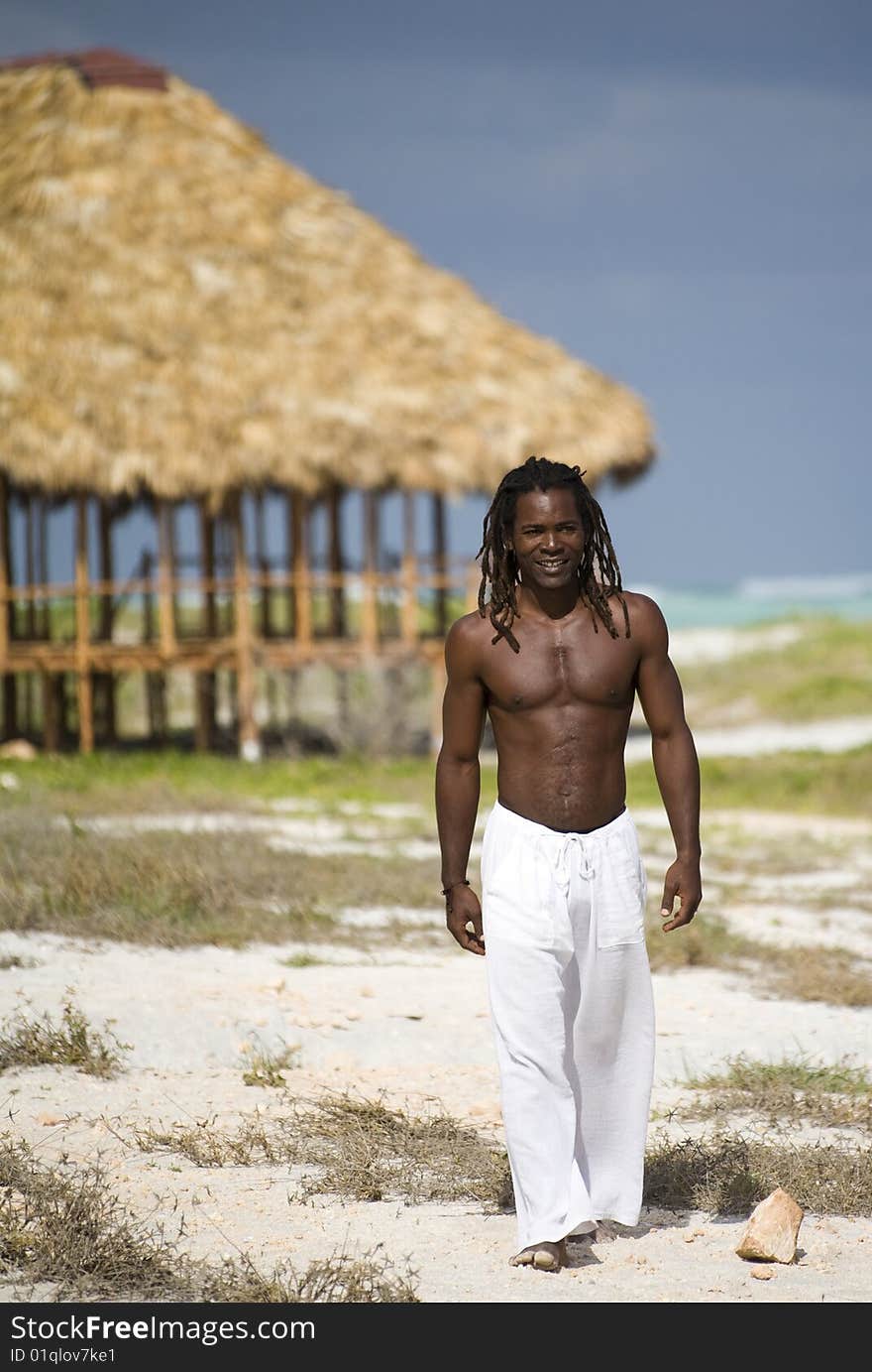 Man walking on the beach in cuba