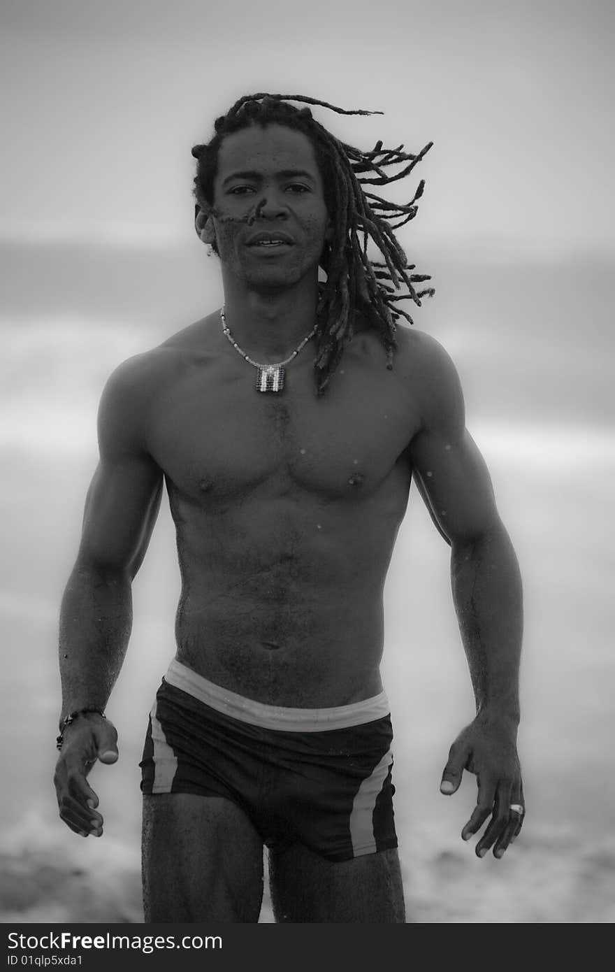 Black man going out the sea black and white picture. Black man going out the sea black and white picture