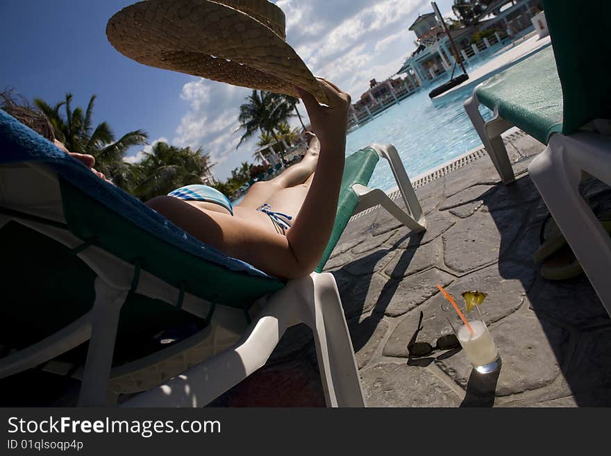 Woman near swimming pool in cuba