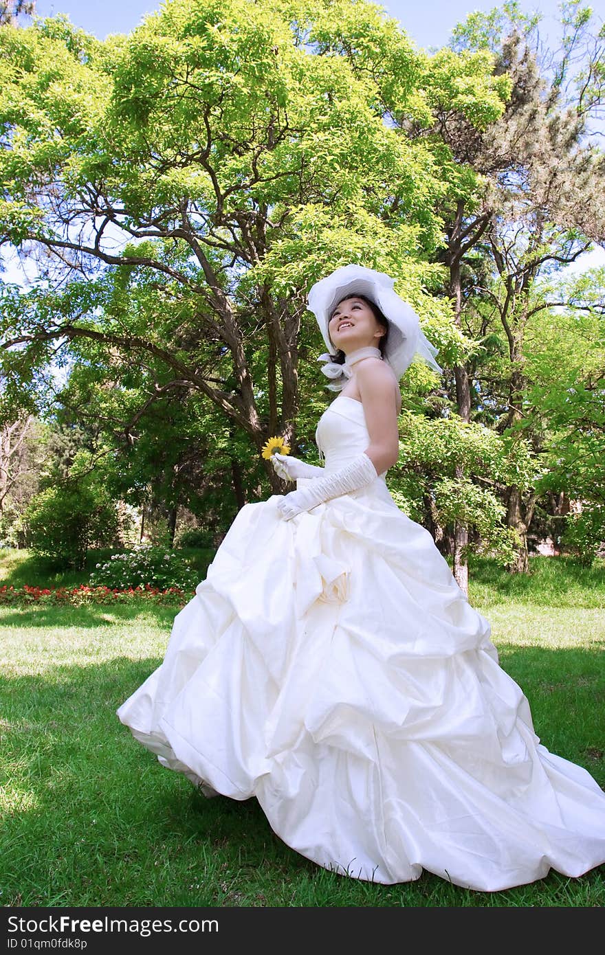 Beautiful bride with white wedding gown