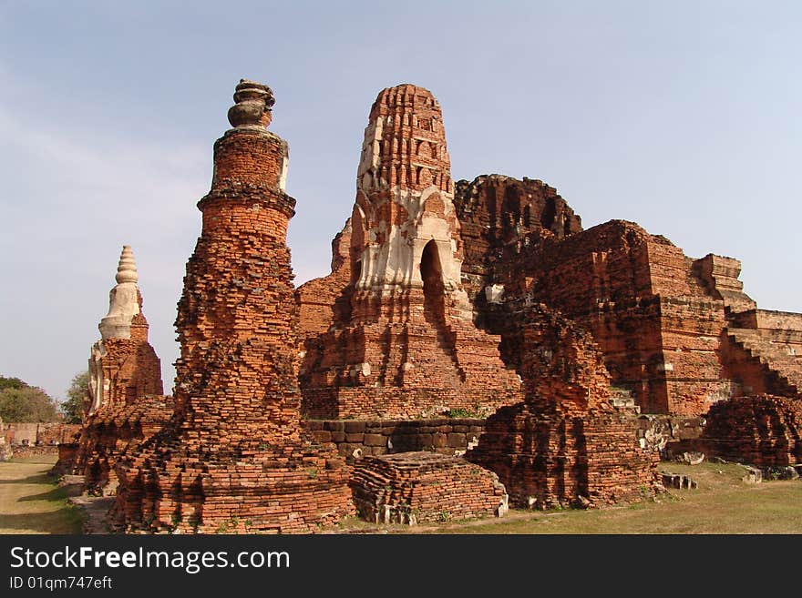 Old ruins in asia at the sky background, red and blue colors. Old ruins in asia at the sky background, red and blue colors