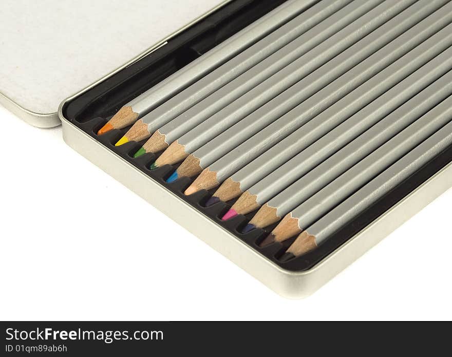 Colored pencils in metal box