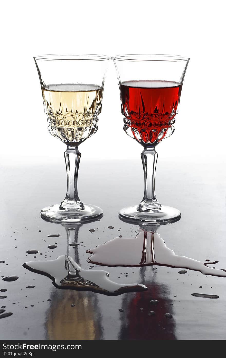 Two glases with white and red wine