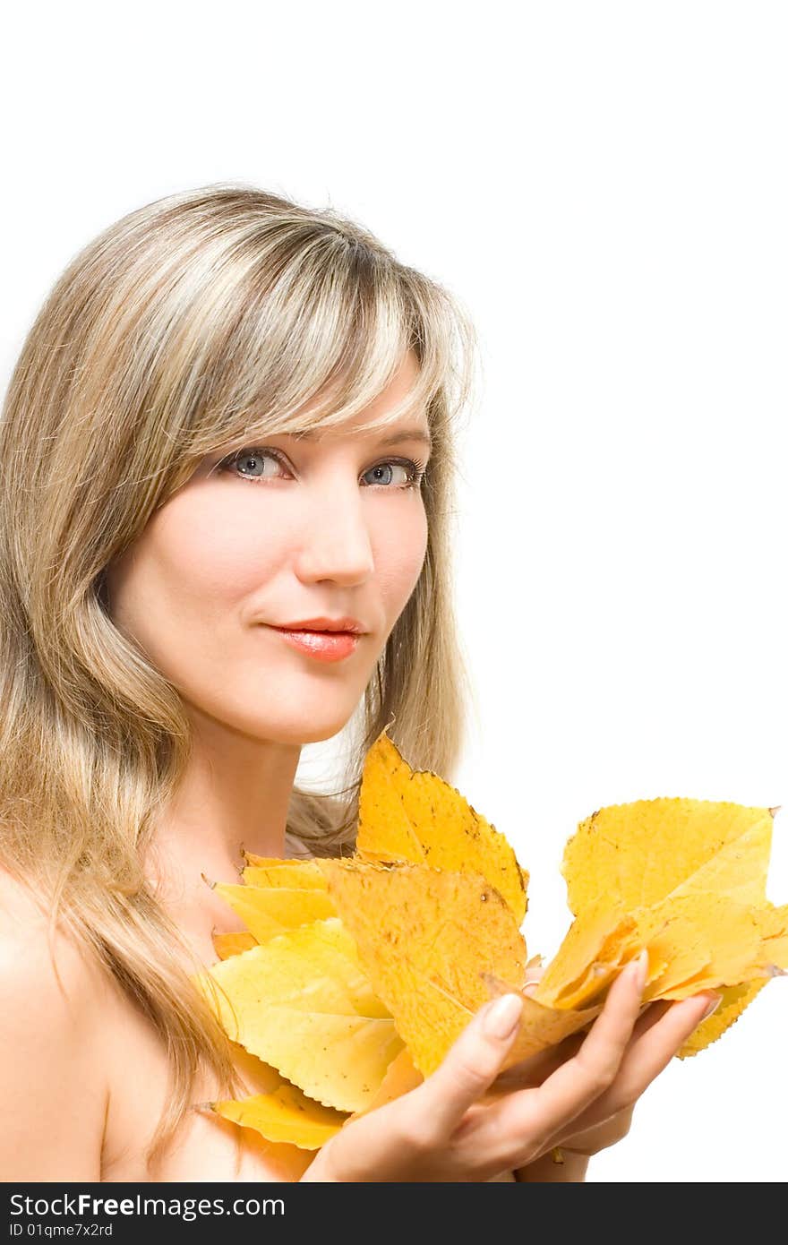 Portrait young woman with fall leafs