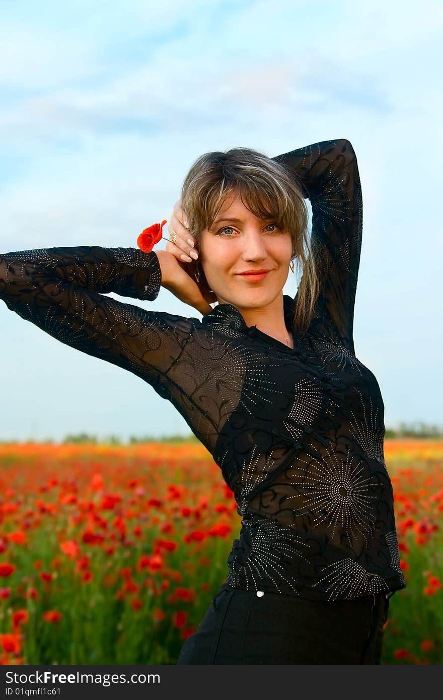 Portrait woman with poppy on nature. Portrait woman with poppy on nature