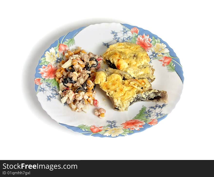 Fried fish with salad