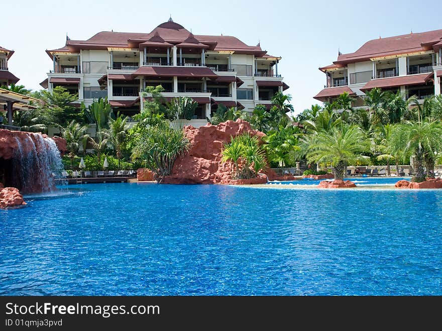 Swimming pool and buildings at a tropical resort in Thailand