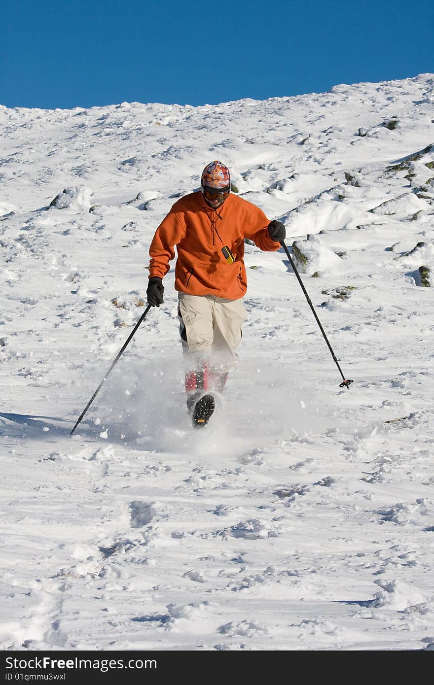 Hiker in high winter mountains