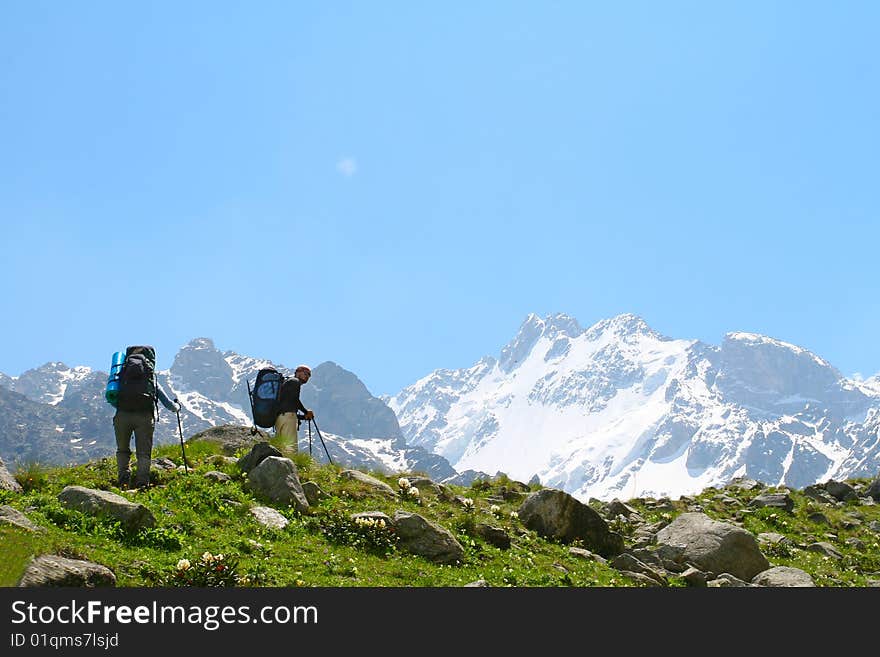 Hikers family  in Caucasus mountains