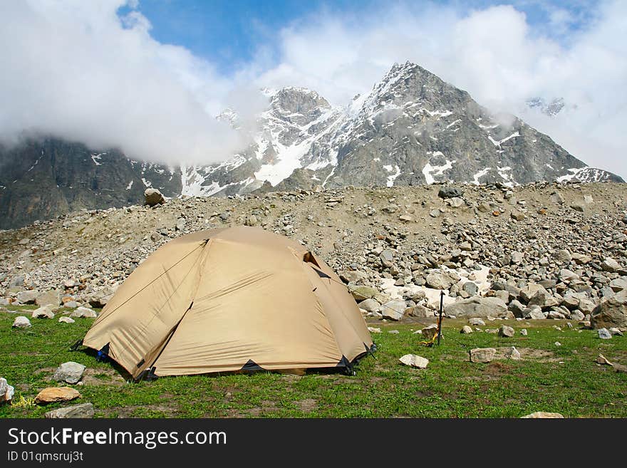 Yelow tent in Caucasus mountain