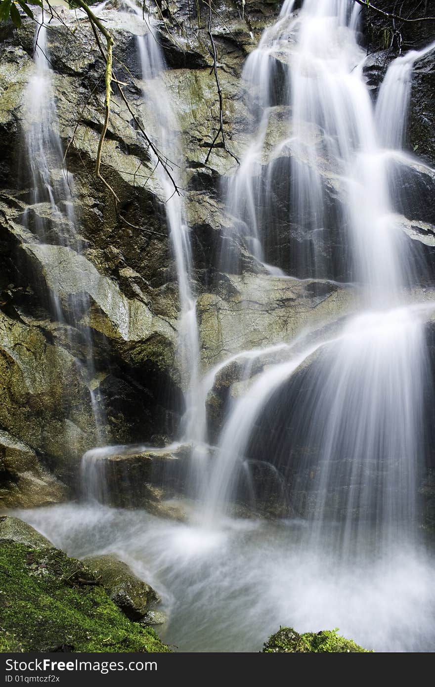 Beautiful Waterfalls rushing down the slippery rocks