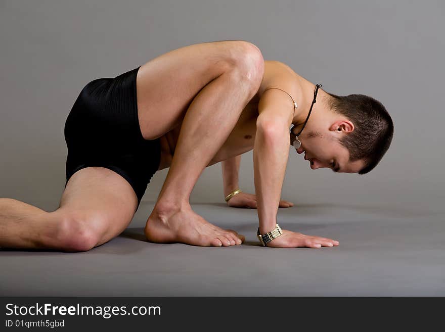 Young Dancer Over Gray Background