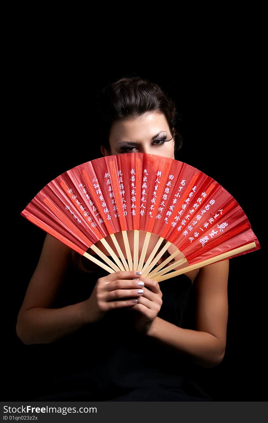 Beautiful woman with fan