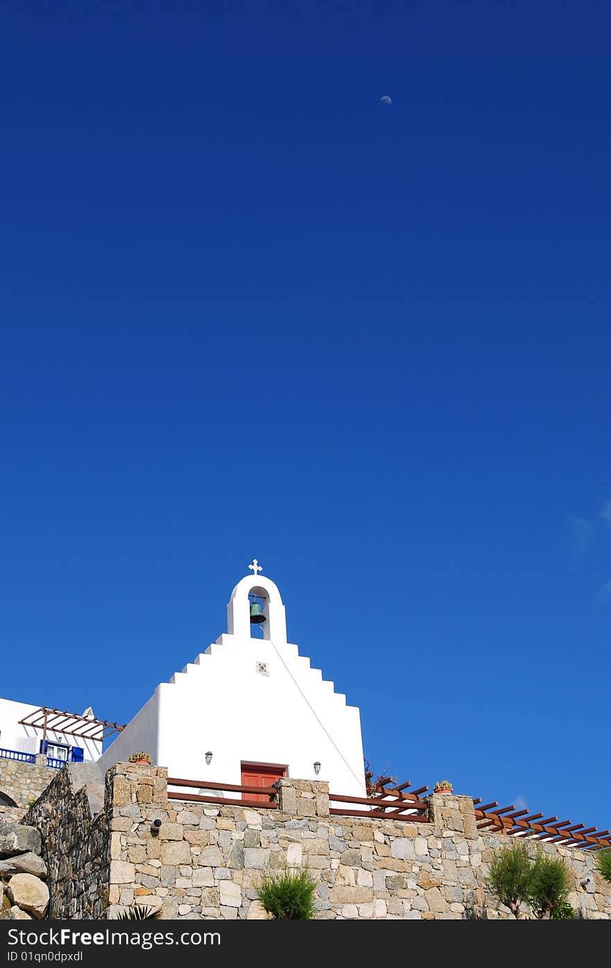 A white church and blue sky in Greece