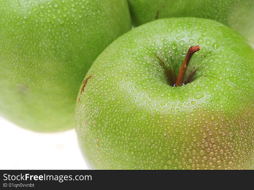 Close-up of green delicious apples with drops. Close-up of green delicious apples with drops