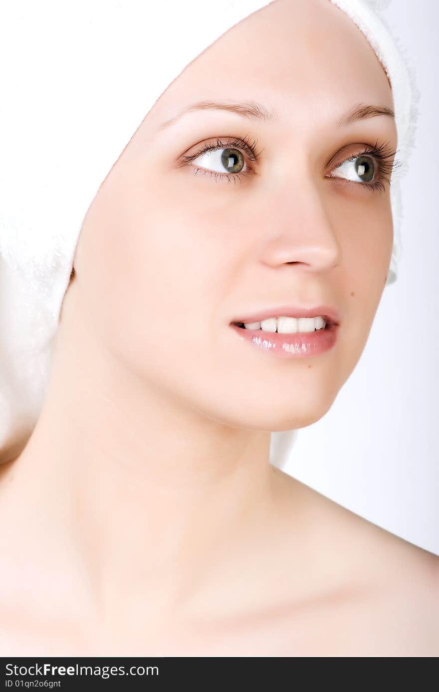 Young girl after bath with towel on her head