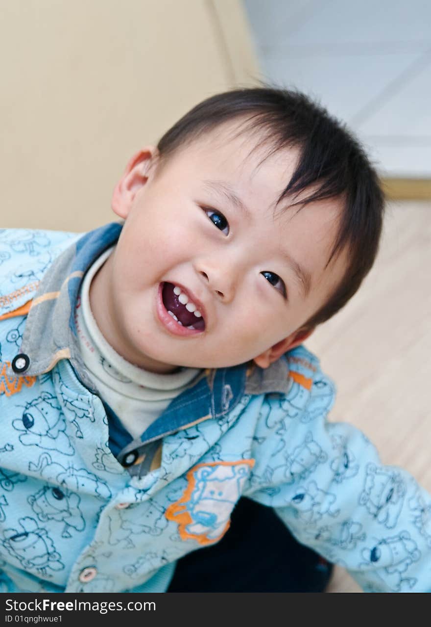 Portrait of naive boy laughing. Portrait of naive boy laughing