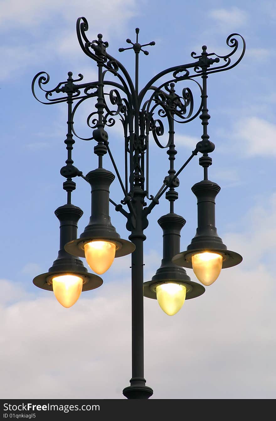 At dusk lighting street lamps. At dusk lighting street lamps.