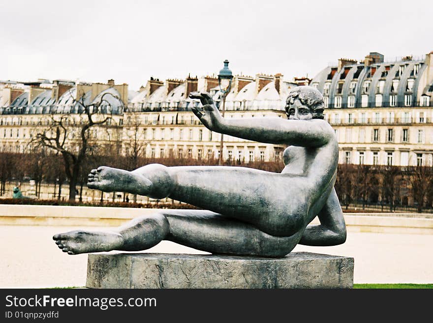 A statue of a lying woman in a Tuileries Park(Paris,France). A statue of a lying woman in a Tuileries Park(Paris,France)