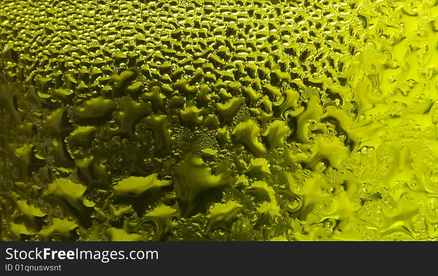 Water-drops on a green glass. Water-drops on a green glass