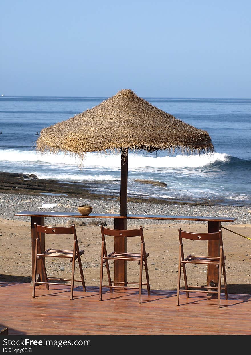 A cool spot overlooking the sea under blue skies. A cool spot overlooking the sea under blue skies