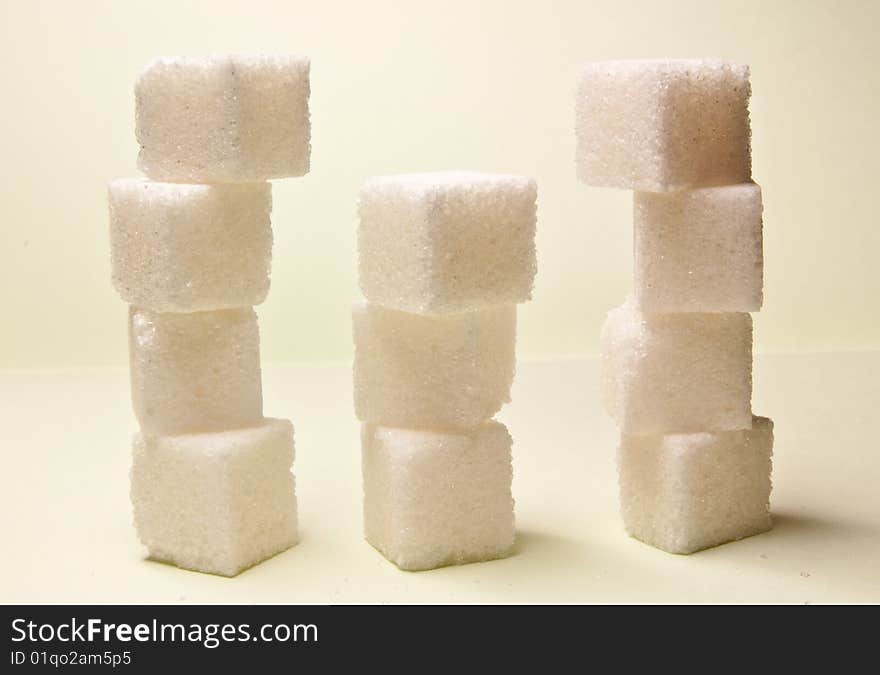 Several pieces of refined sugar. Several pieces of refined sugar