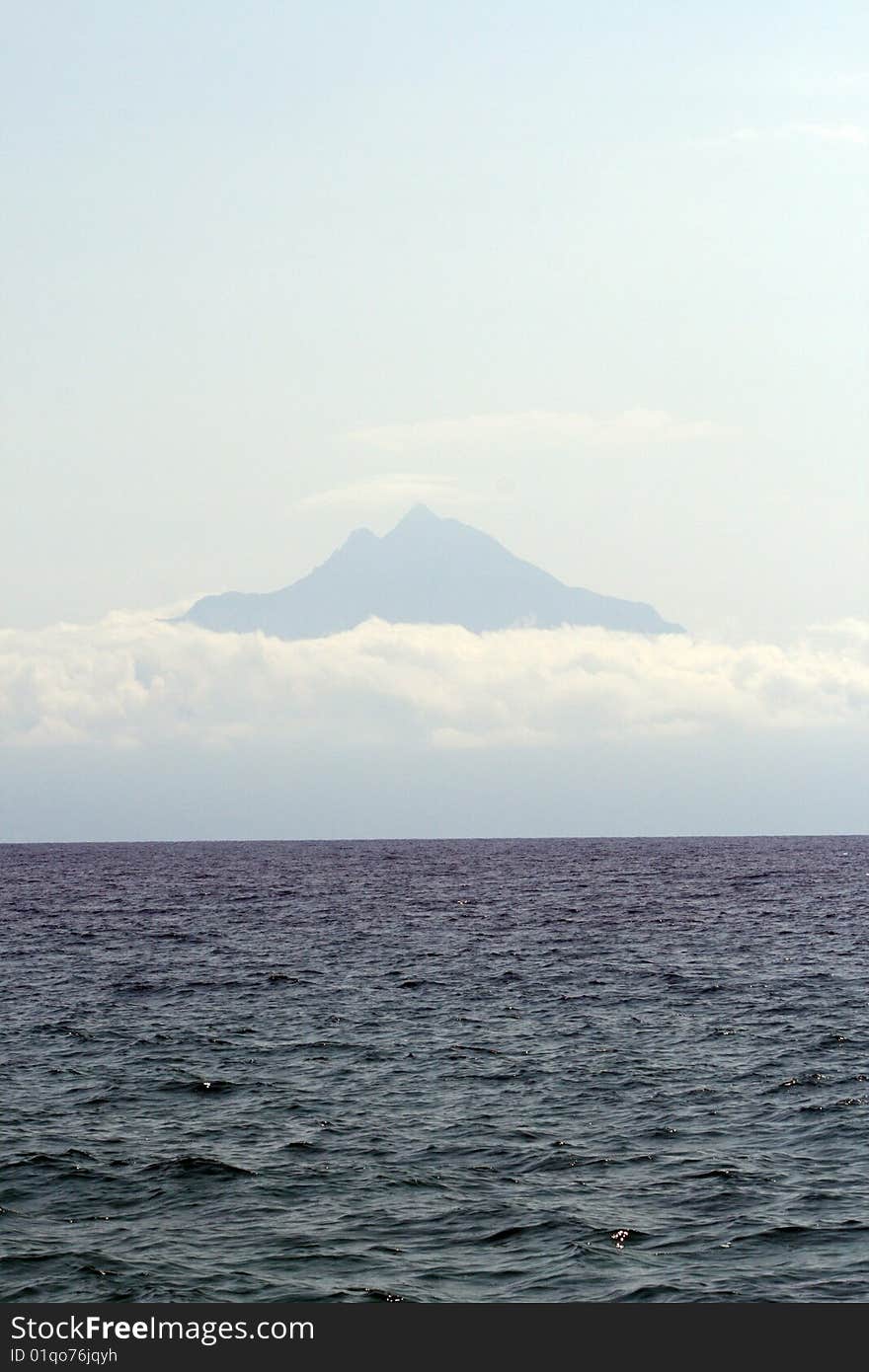 Sea view scene,and in the background the athos mountain.