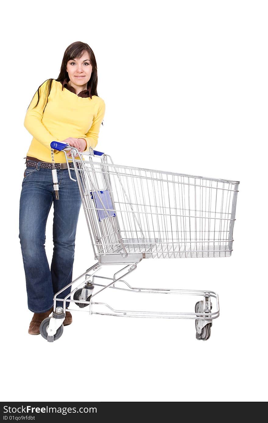 Attractive brunette woman with shopping cart