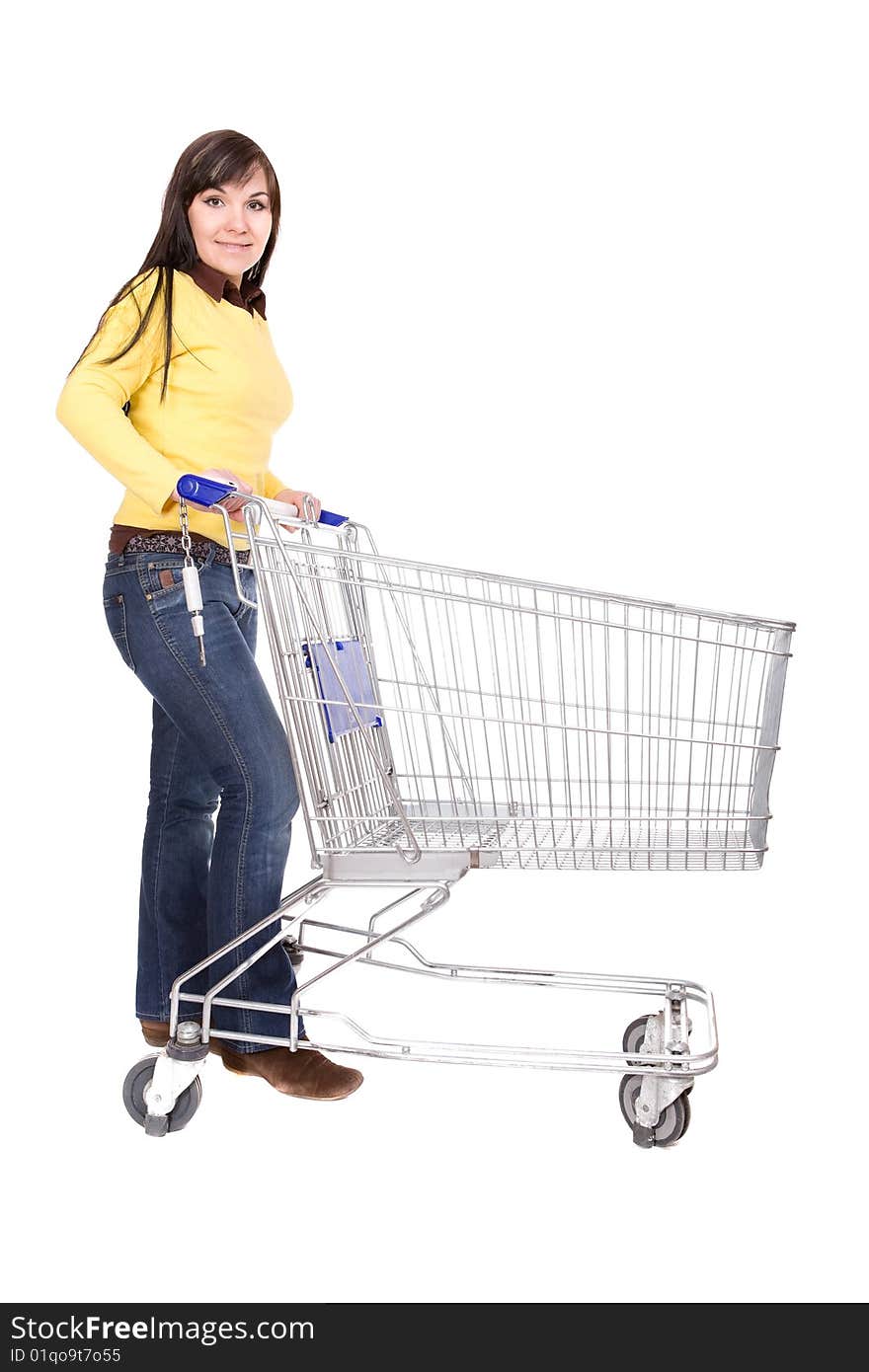 Attractive brunette woman with shopping cart